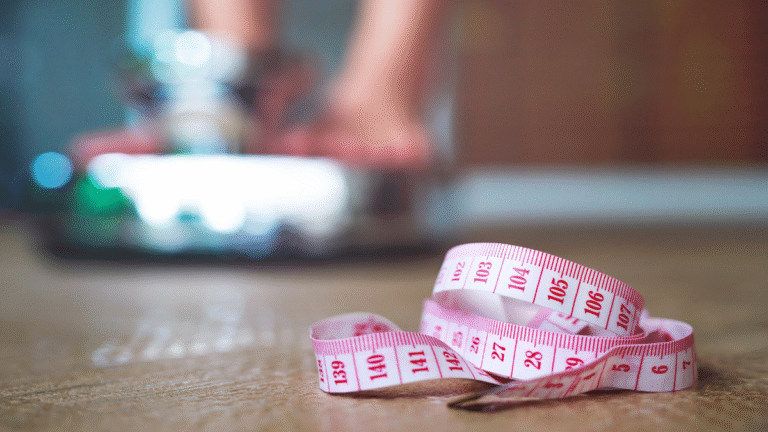 A measuring tape and weight scale to show that weight loss on GLP-1 is on everyone's mind.