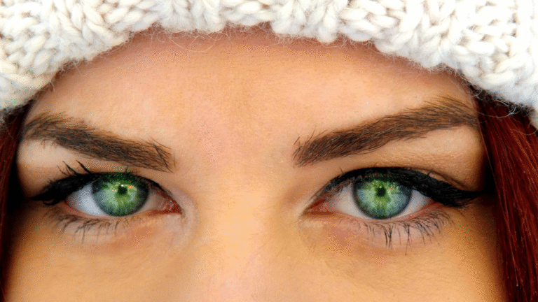 An image of a woman with stunning green eyes to depict genetics