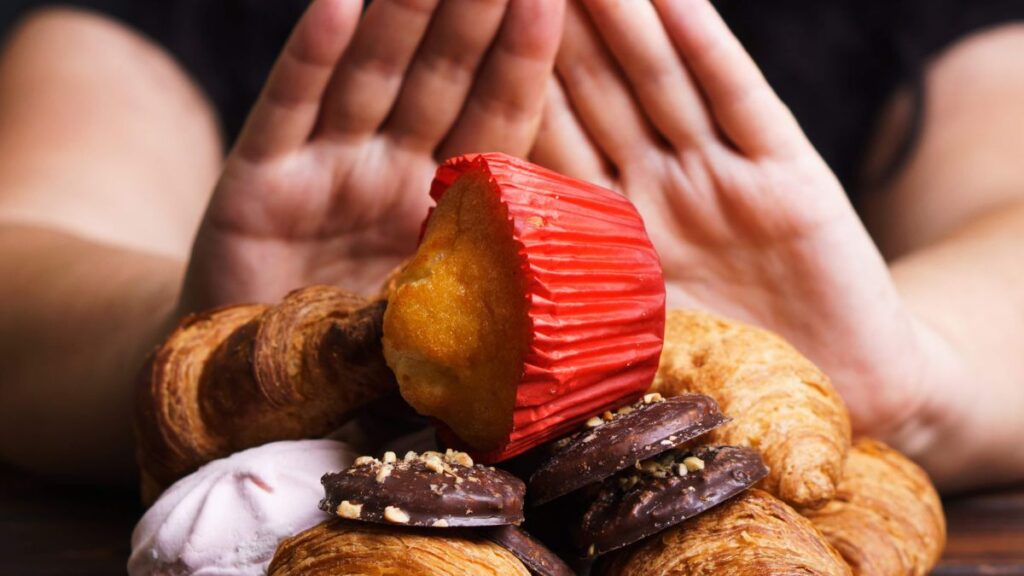Photo of a woman refusing to eat junk food