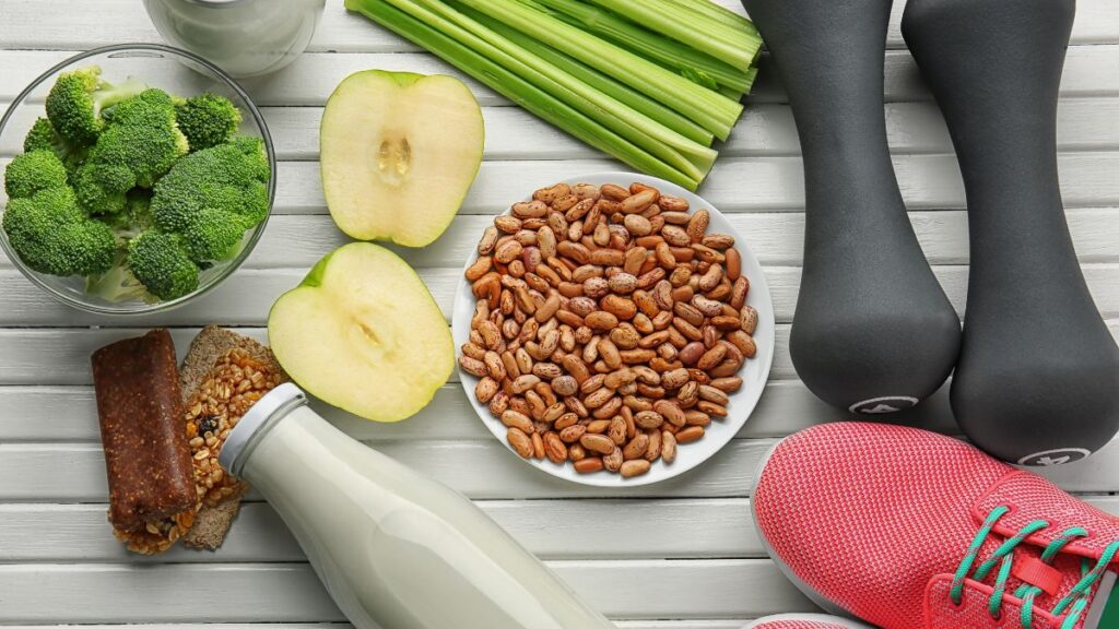 Assorted Healthy Food with Fitness Equipment