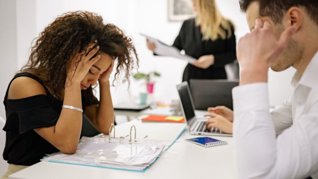 Stressed Woman Working at the Office 